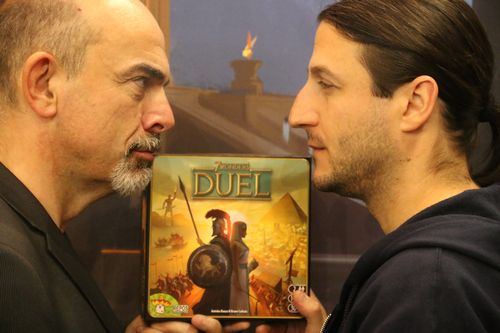 Bruno Cathala v.s Antoine Bauza ... know you opponent @ Spiel in Essen 2015 One of my favorite. I asked them to pose at the booth and they really liked the result. Working close as a team of designers to create the game where knowing you opponent brings out tenseness during the Duel.