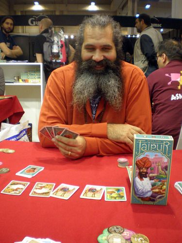 Playing Against the Man on the Cover @ Spiel 2009 I was playing the game explained by the man in front of me and later I saw the box cover and was saying: “I played against the man of the cover Malcolm Braff”. A nice moment at Spiel in Essen